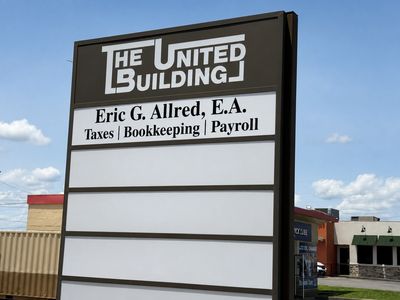 Sign for The United Building and Eric G. Allred's tax and bookkeeping services office