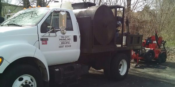 <img src="tacktruck.jpg" alt="tri city paving asphalt tack truck">