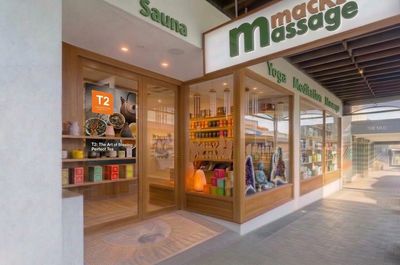 Exterior of a wellness spa offering massage, sauna, yoga, and meditation services.