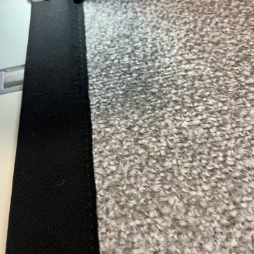 Our Taped edging fabric being machine sewn to one of our carpet ranges.