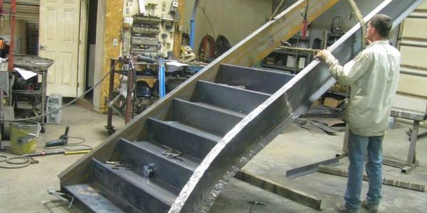 Steel fabrication of custom stairs.