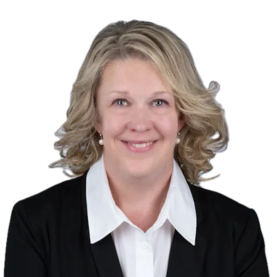 Professional woman smiling in business attire.