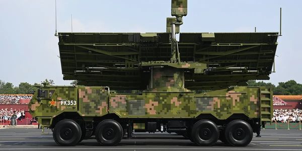 Chinese military vehicle with camouflage paint and radar system.