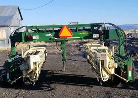 LMC Model 6603 farm equipment on a dirt path.
