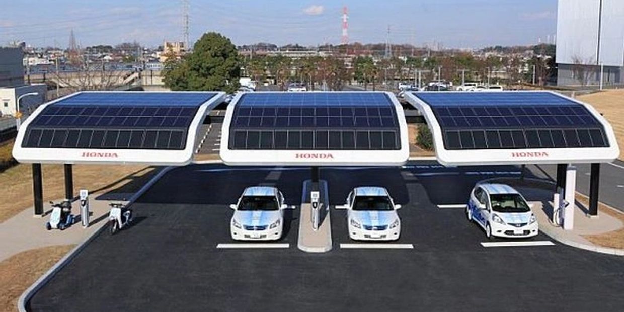Off grid solar charging platform.  Providing shade, while producing power for auto- truck fleet.