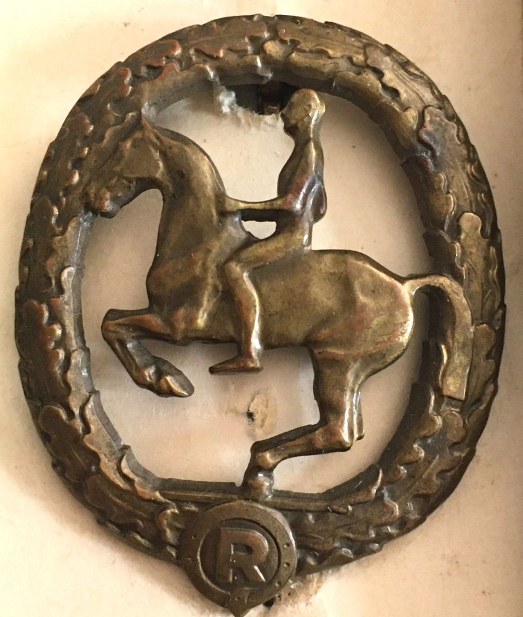 A cased German rider's badge in bronze from the maker L.CHR.LAUER of ...