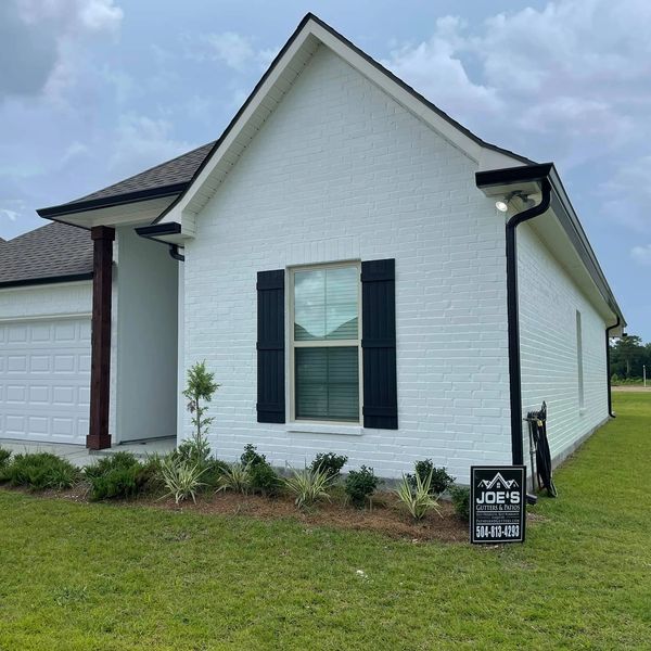 Musket Brown Gutters On White House