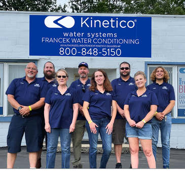 Francek Water Conditioning Employees in front of Francek Water Conditioning business store front