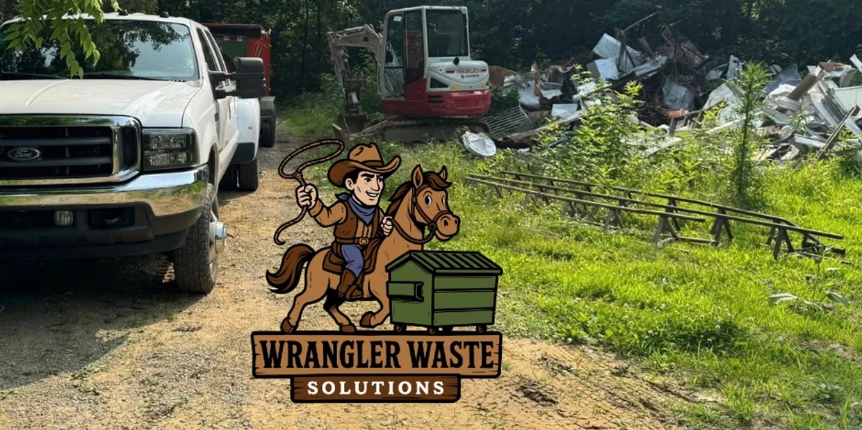 Wrangler Waste Solutions truck and equipment at a debris cleanup site.