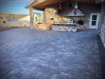 Paver patio with outdoor kitchen