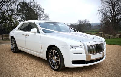 Rolls Royce wedding car with ribbons