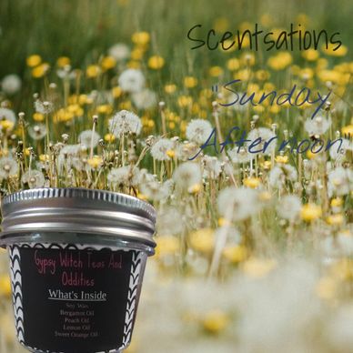 A scented candle jar in a field of dandelions and yellow flowers with text overlay.