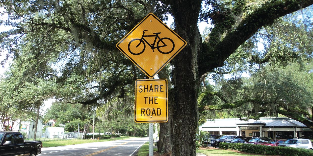Image of Bike share road sign that says share the road