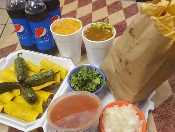 Close up image of food with drinks on the table