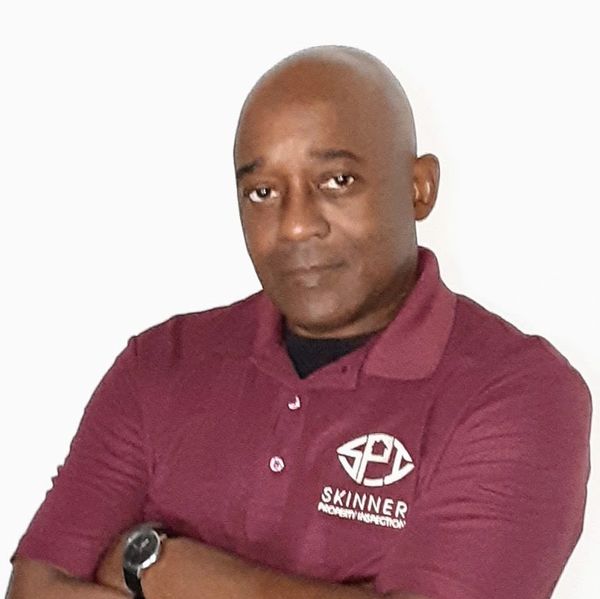 picture of black home inspector