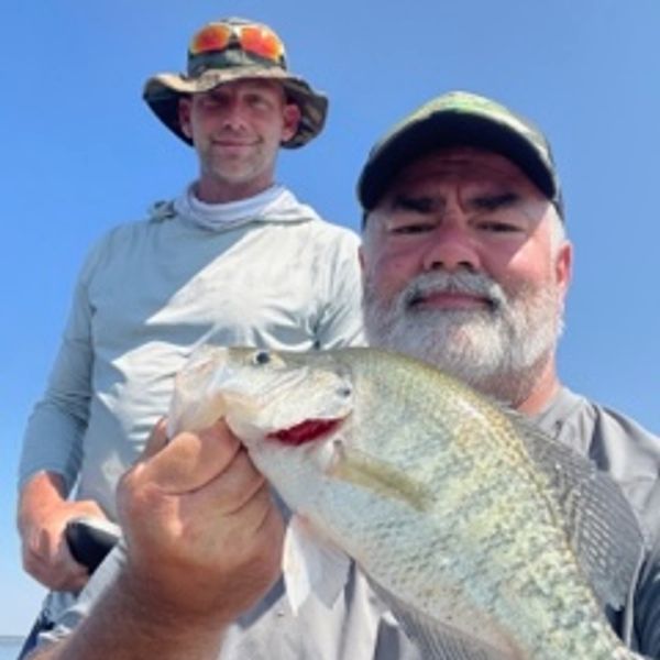 Dan Mabery and Cody Smith holding a 2lb crappie