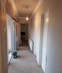 New radiator, electrical alterations, plasterwork, skirting & architrave