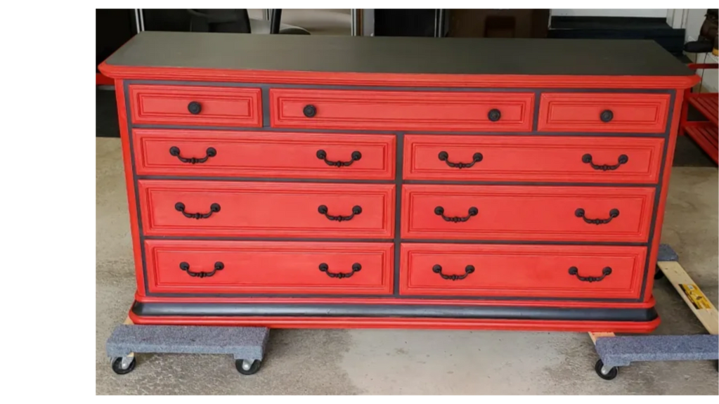 Dresser painted a red and black with new black hardware 
