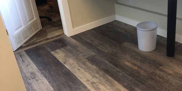 Wood flooring in a bathroom.