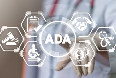 Image of person pointing to the terminology "ADA".