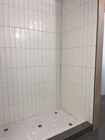 We laid the tile vertical for a modern look.