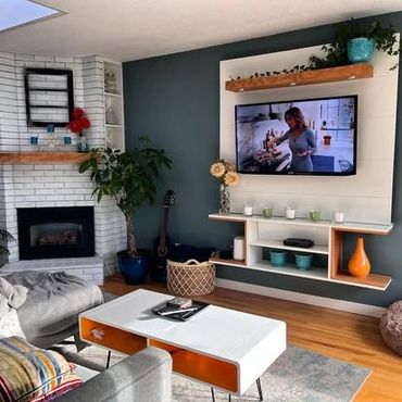 A comfy cozy living room design with some custom built in's like the wall unit.