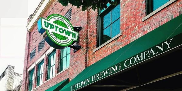 Uptown Brewing Company building facade and sign.