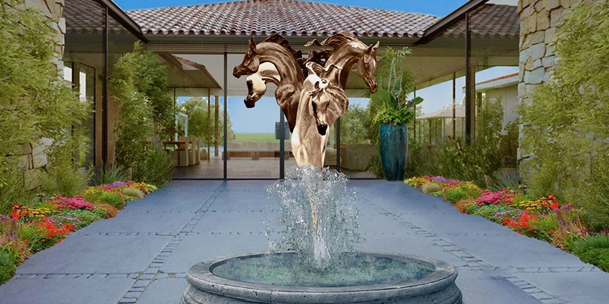 Fountain in bronze highlighting four full sized horse heads, a superb figurative bronze sculpture.