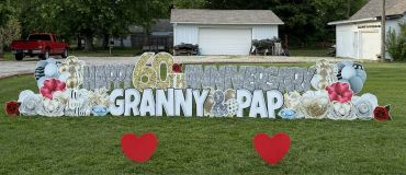 Yard sign celebrating a 60th anniversary for Granny and Papa.