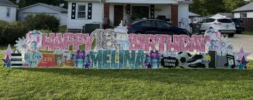 Outdoor yard birthday sign for Melina.