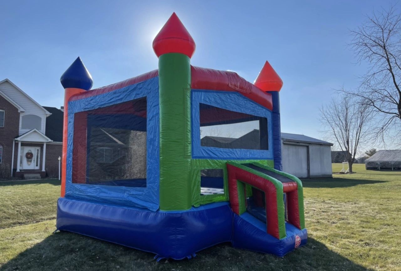 Green Blue and Red Standard Bounce House with Basketball Hoop