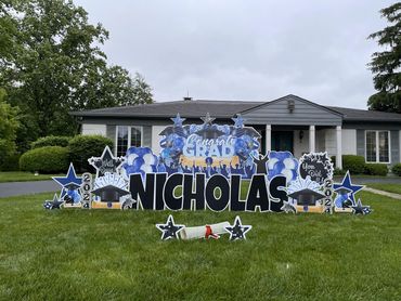 Large blue panel graduation yard sign. Yard card in Indianapolis Indiana. Also in Greenwood