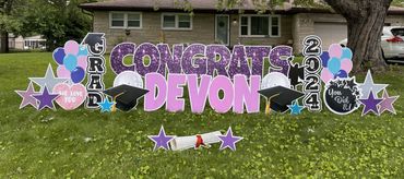 Purple sparkle and pink graduation yard card greetings. Yard sign in Cumberland Indianapolis