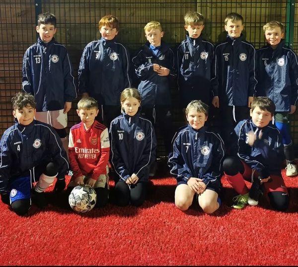 Latest U11s team photo sporting the new rain jackets (taken 28/01/2022)