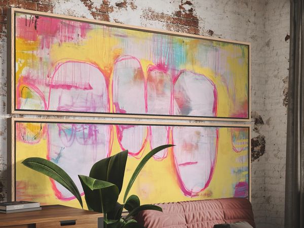Abstract colorful paintings on a brick wall.