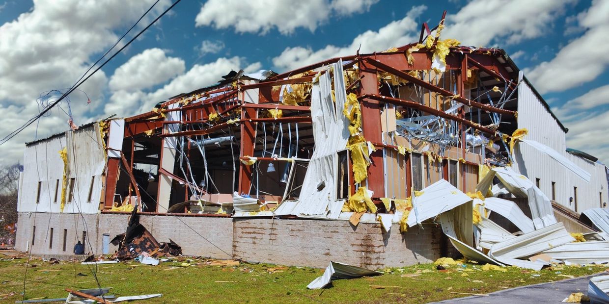 pre-engineered metal building damaged by storm