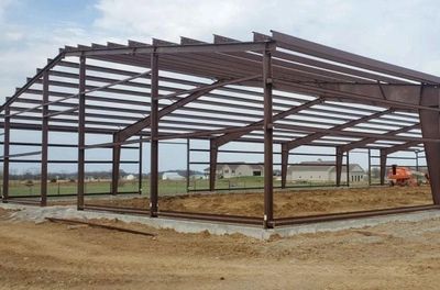 PRE-ENGINEERED RED IRON (RIGID FRAME) METAL BUILDINGS