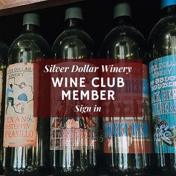 Wine bottles from Silver Dollar Winery with a Wine Club Member sign.