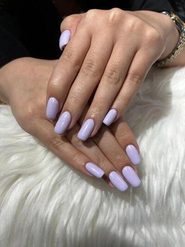 Classic squoval-shaped pastel lilac gel manicure, perfectly done at Cute Cut Beauty Salon & Spa.