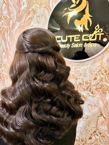 Elegant half-up, half-down hairstyle with voluminous Hollywood waves, created at Cute Cut Beauty Sal