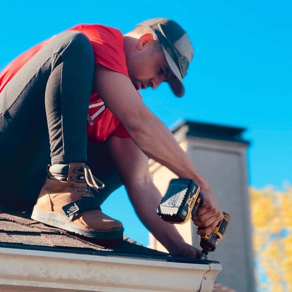 Gutter guard installation in progress by The A Team Pressure Washing in Springfield MO