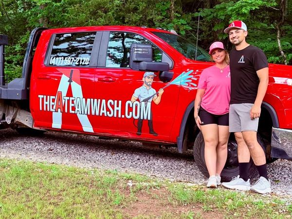 Professional pressure washing team cleaning a house exterior in Springfield Missouri