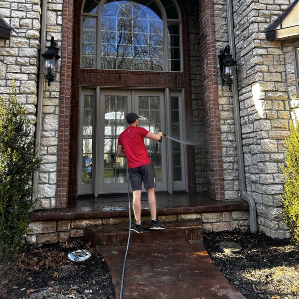 Pressure washing process in Springfield MO by The A Team, safe and effective exterior cleaning.
