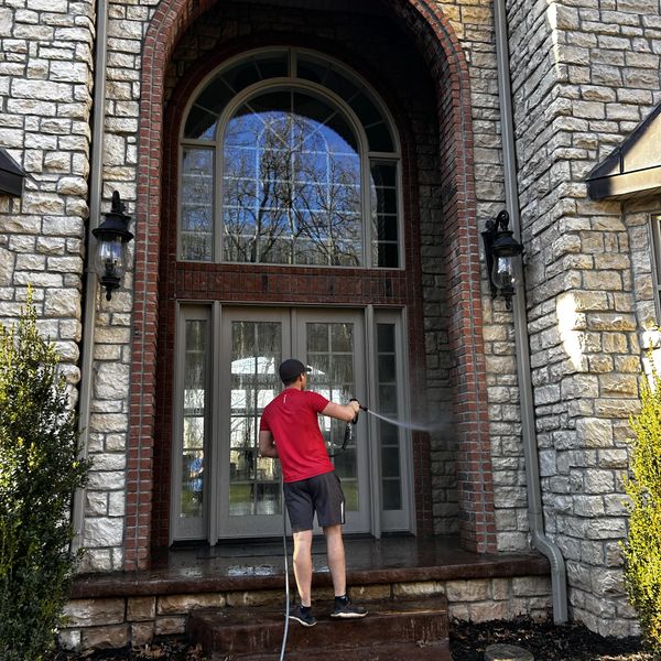 House washing in Springfield MO cleaning stone and brick siding