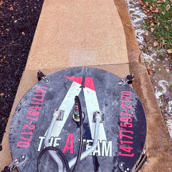 Professional driveway and sidewalk surface cleaning by The A-Team Pressure Washing in Springfield MO