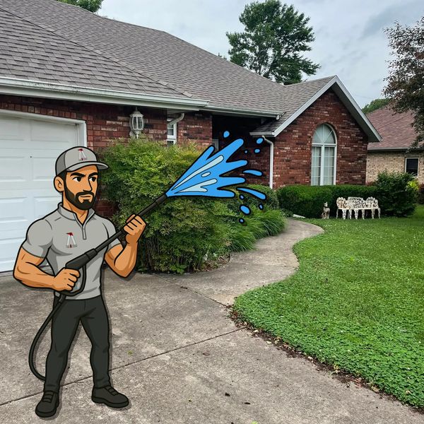 Dirty driveway and sidewalk with heavy algae buildup before surface cleaning in Springfield MO