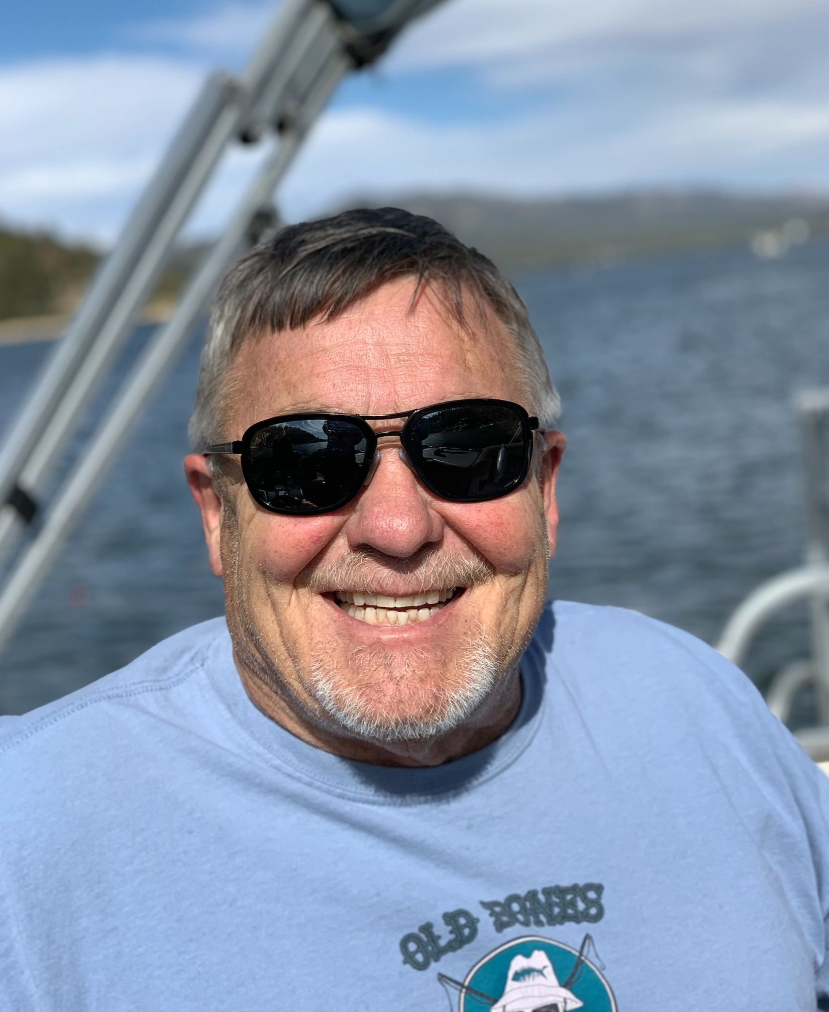 Bankruptcy Attorney Greg Doan standing by on his pontoon ready to help you.