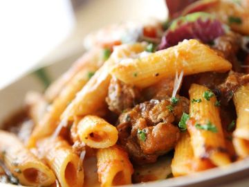 Penne with meat sauce.