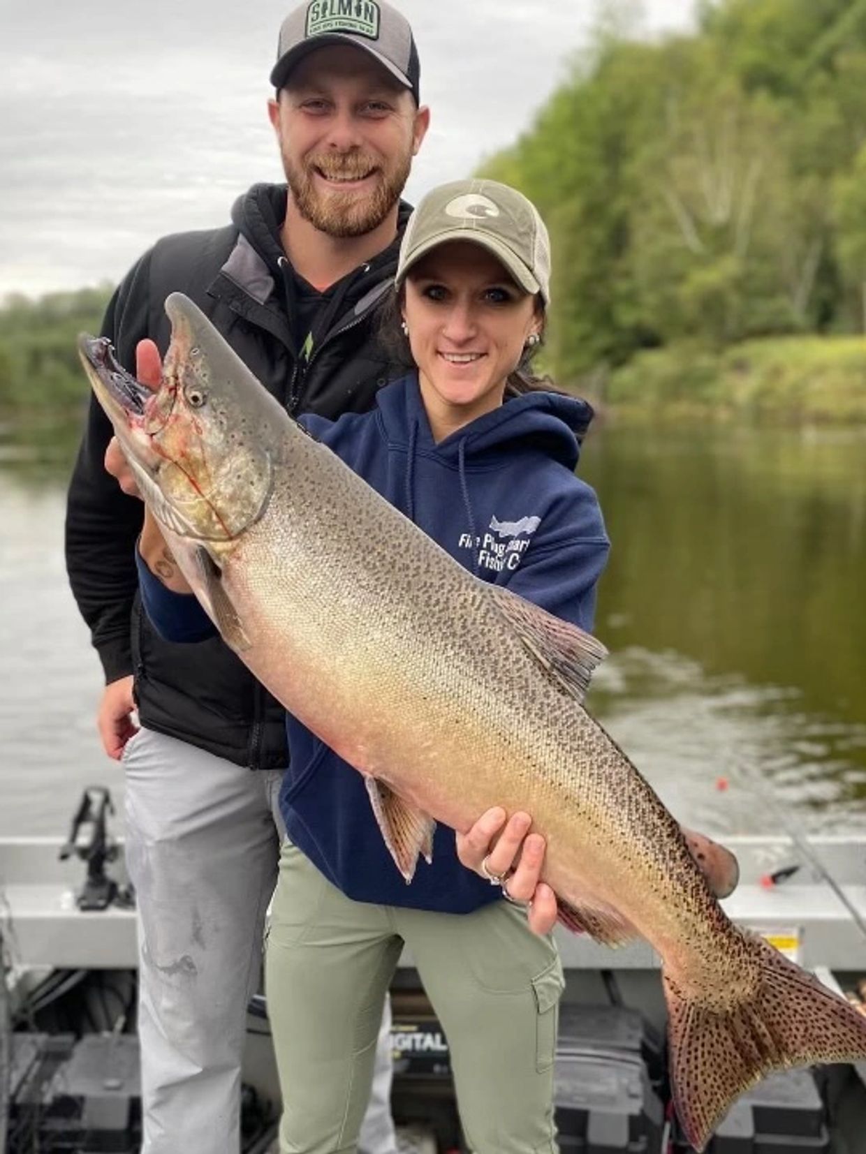 Captain Alex & his wife Emma with a huge salmon!