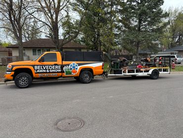 Picture of the mowing truck with our name and logo